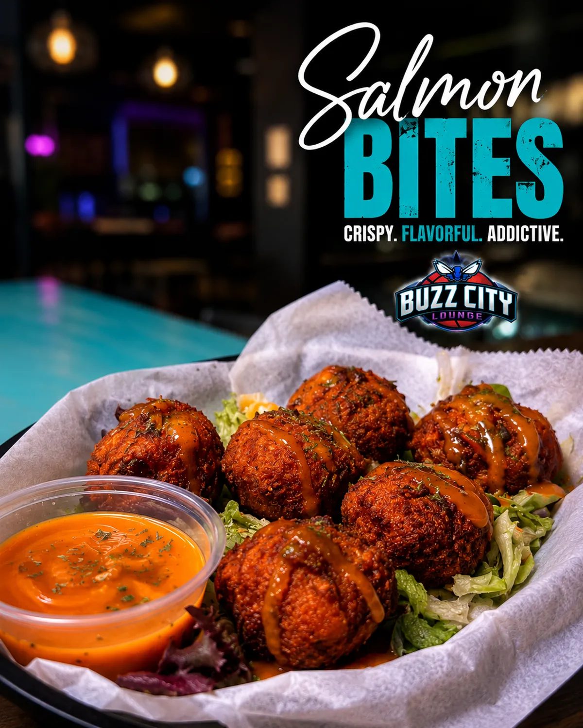 Buzz City salmon bites, crispy and flavorful, served with dipping sauce