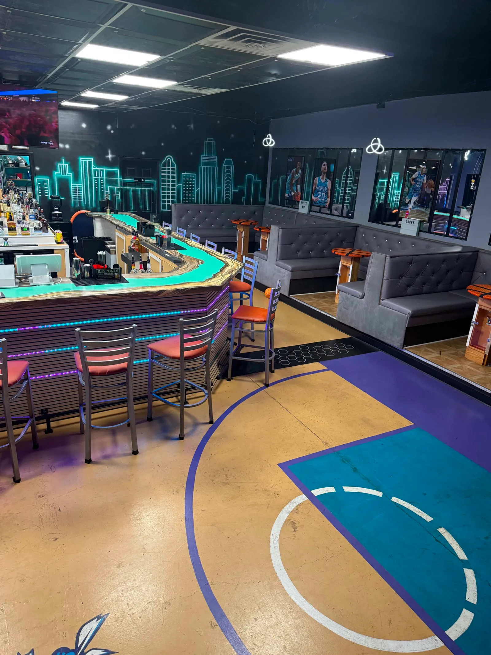 The basketball court built into the floor at Buzz City Sports Venue in Charlotte
